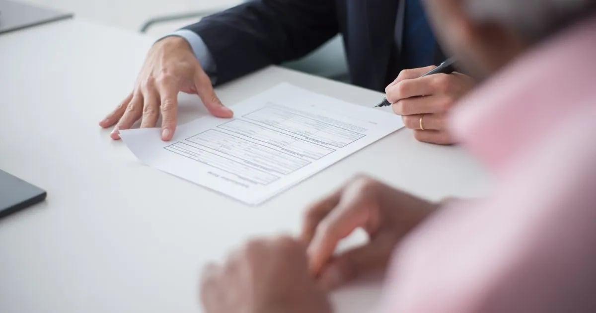 Two professionals signing a consulting contract